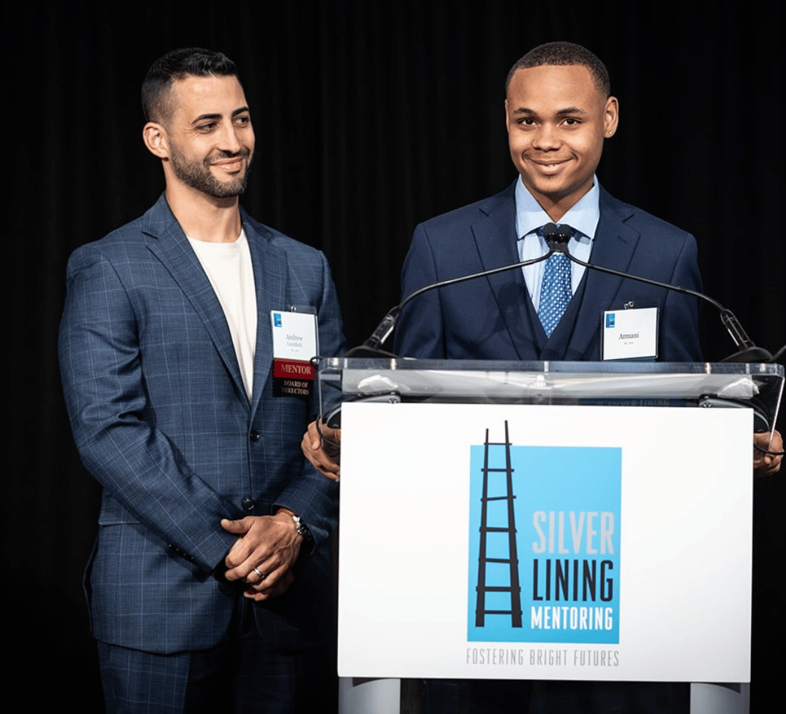A mentor and mentee speaking together at a Silver Lining Mentoring event