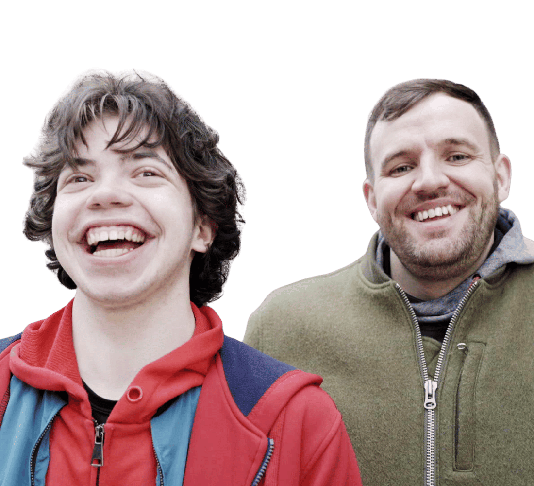 A mentor and mentee laughing together