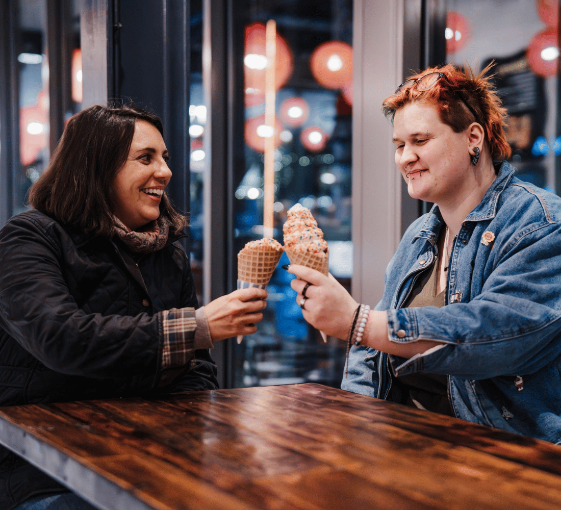 A mentor and mentee sharing ice cream